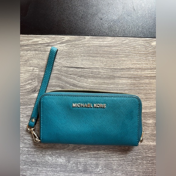 Michael Kors Handbags - ** SOLD ON MERCARI ** Michael Kors Blue Wristlet Clutch